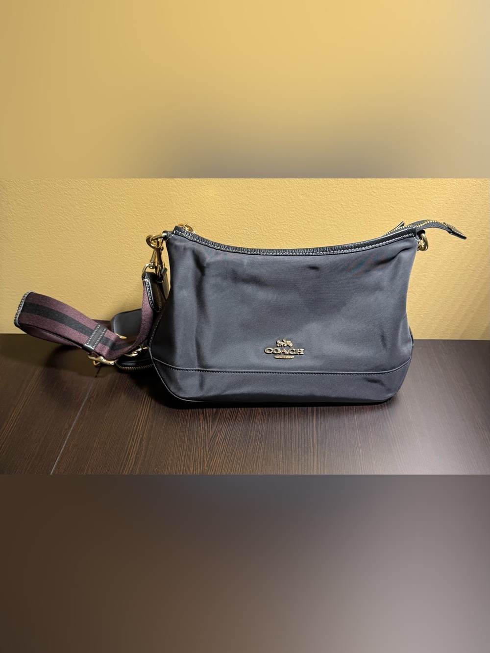 Coach Black Ellis shoulder bag features lightweight nylon construction